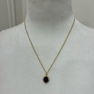 14k Gold & onyx pendant. Shown with the gold long chain listed separately